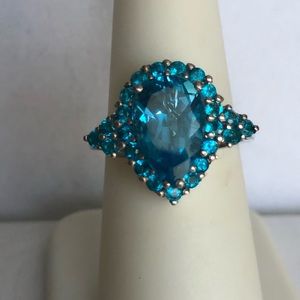 Electric Blue Topaz Pear Cut surrounded by Neon Apatite Ring